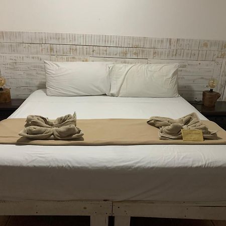 Casa Caribe Cancún Buitenkant foto A bed