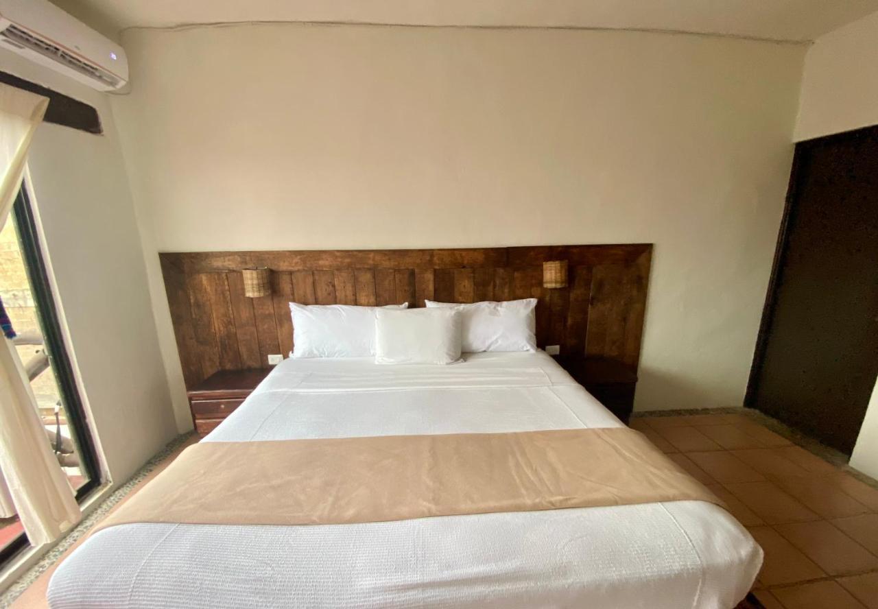 Casa Caribe Cancún Buitenkant foto A bedroom at the hotel