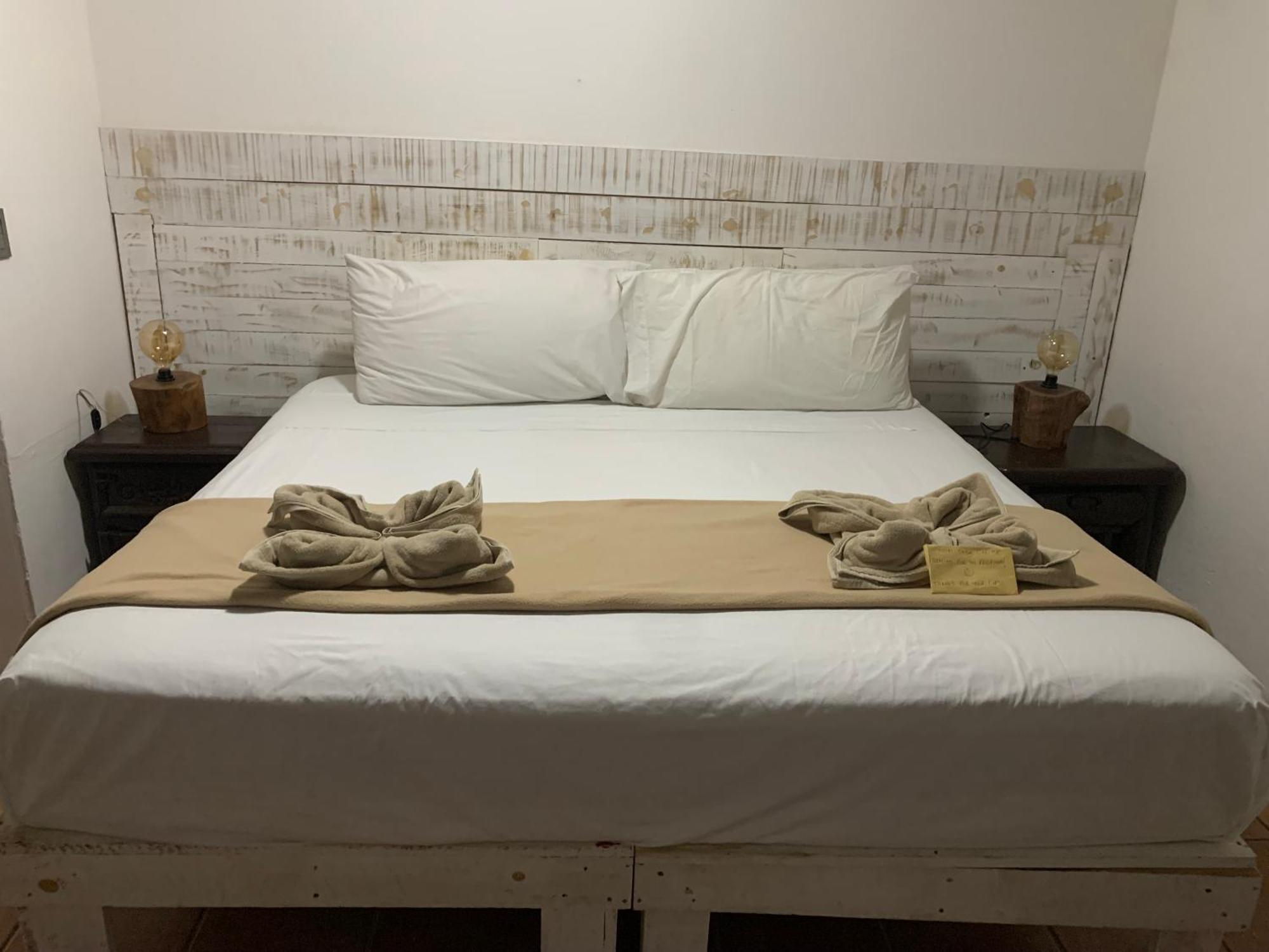Casa Caribe Cancún Buitenkant foto A bed
