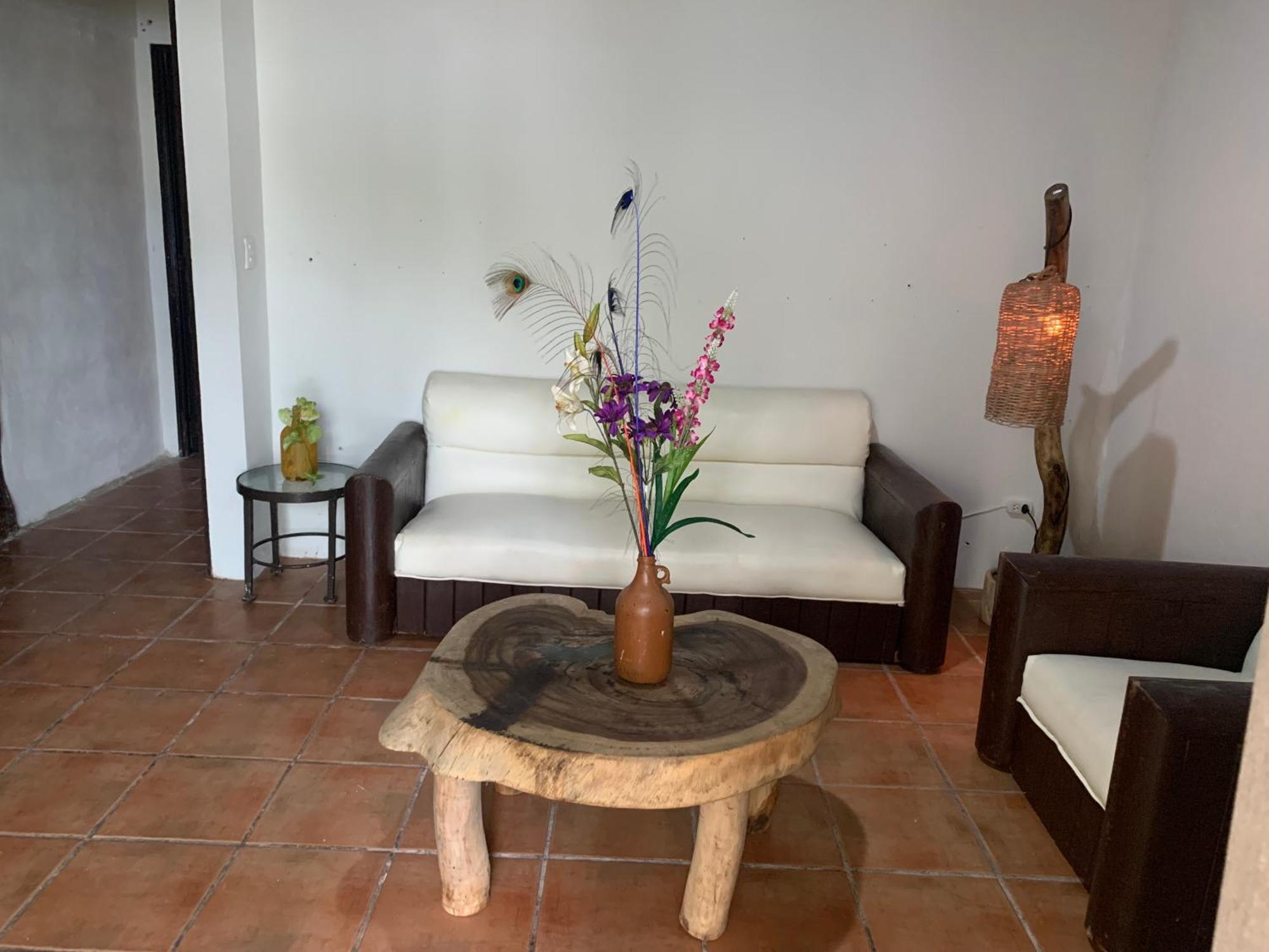 Casa Caribe Cancún Buitenkant foto A living room in a typical house in the community